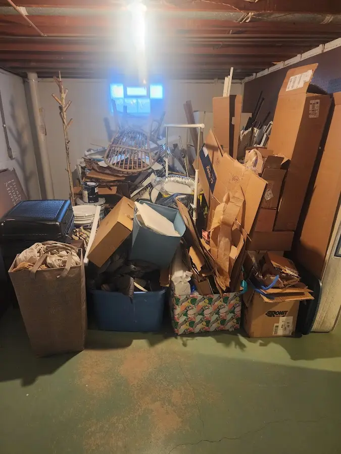 Roll-off dumpster container at job site for Concrete Dumpster Rental in Ellisville